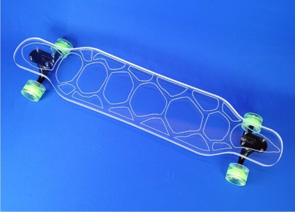 clear longboard with a turtle shell design engraved on it