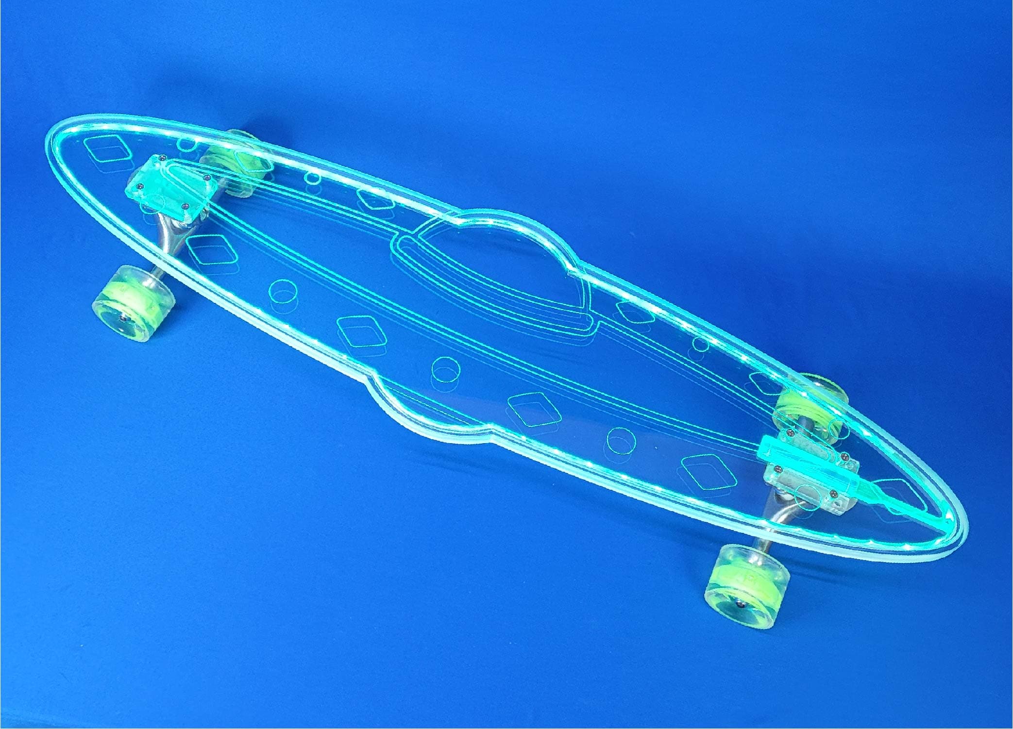 This clear Ufo shaped Longboard has an LED light strip glued inside a channel cut into the bottom of the board to make the longboard glow and the ground underneath it.