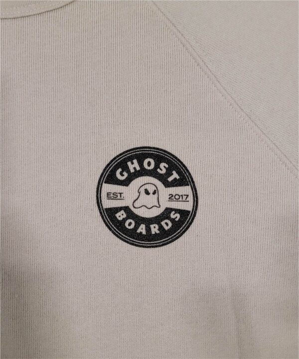 Ghost Boards Logo Closeup of the Beige Crewneck Sweatshirt
