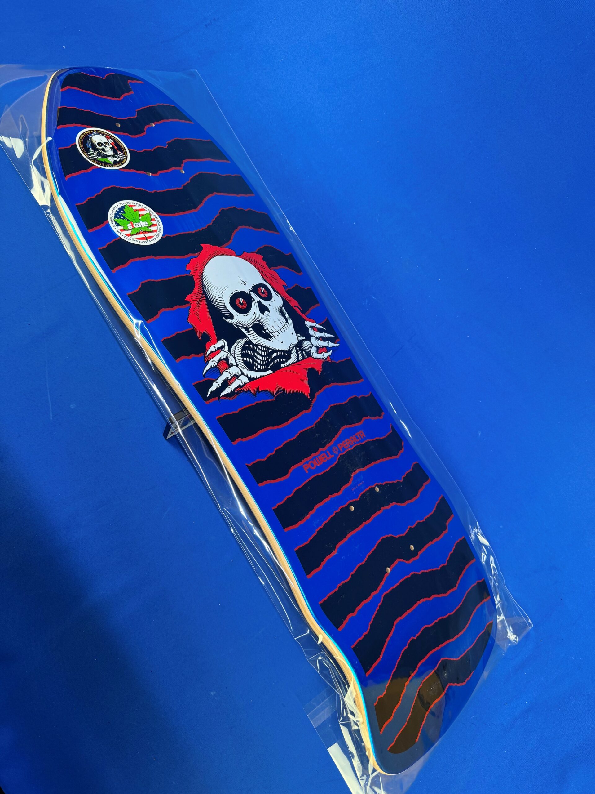 The Powell Peralta OG Ripper Checker 10" Blacklight Foil Skateboard Deck